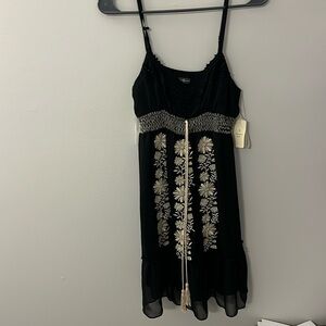 Little black dress boho floral print. Adjustable straps.